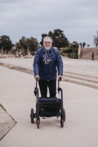 elderly person using a walking aid