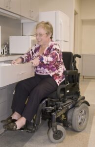 Woman using an electric wheelchair